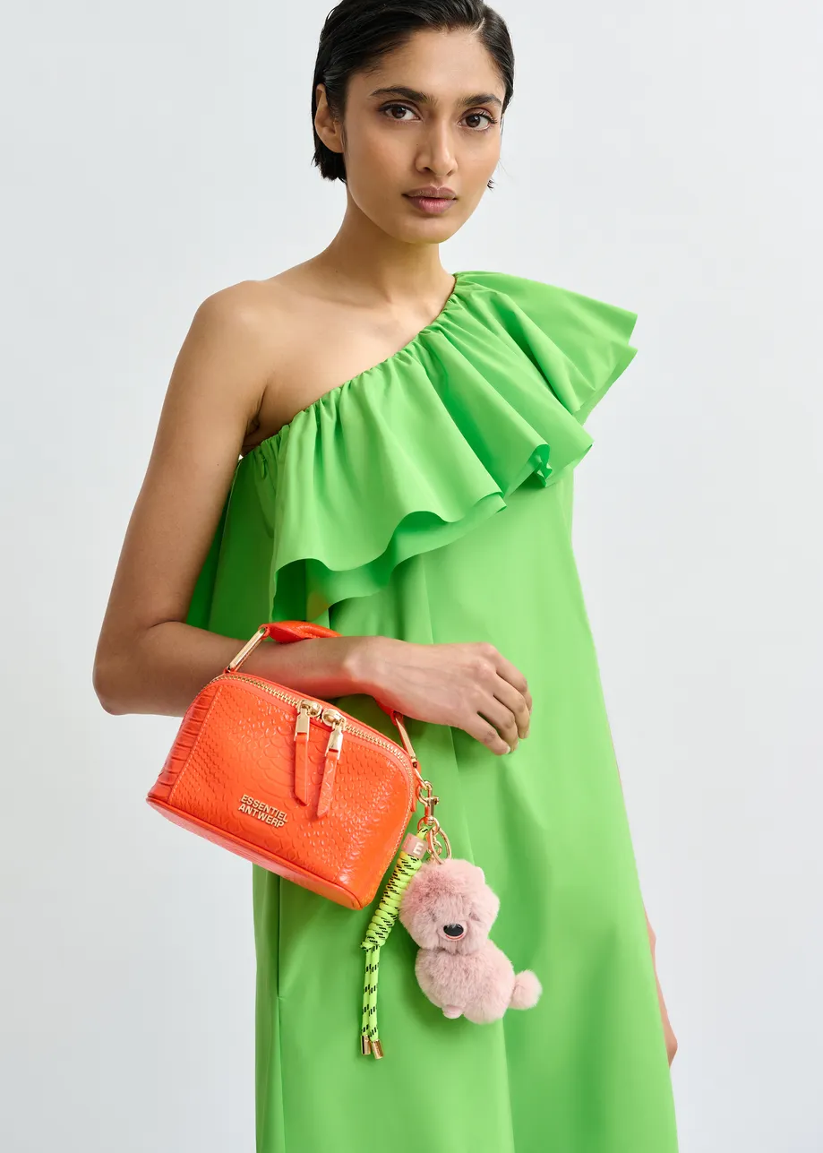 Green one-shoulder mini dress with ruffle details