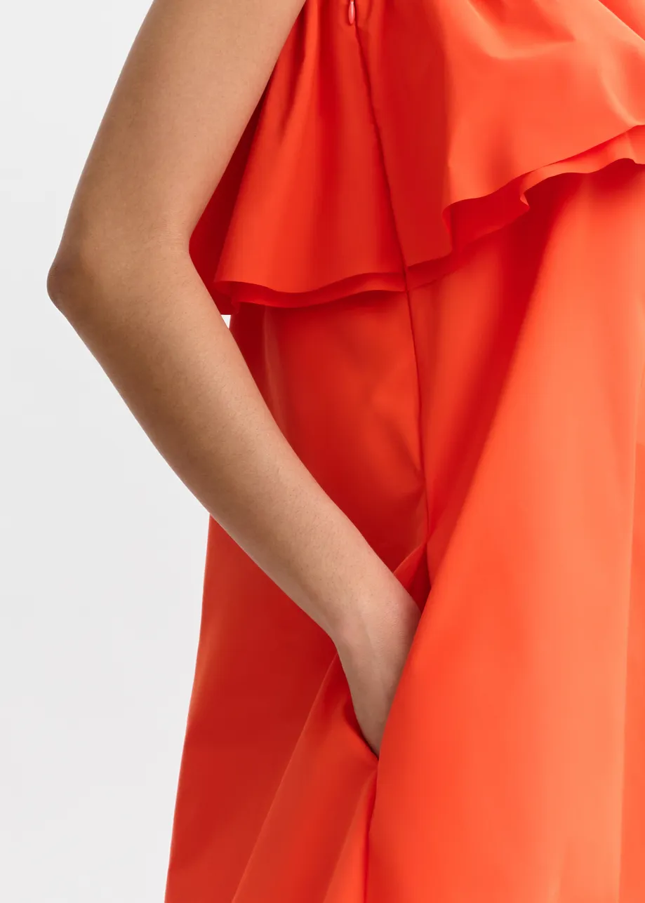 Orange one-shoulder mini dress with ruffle details