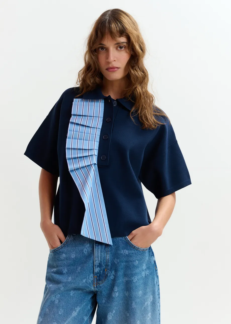 Marine- en lichtblauwe fijngebreide polo met volants