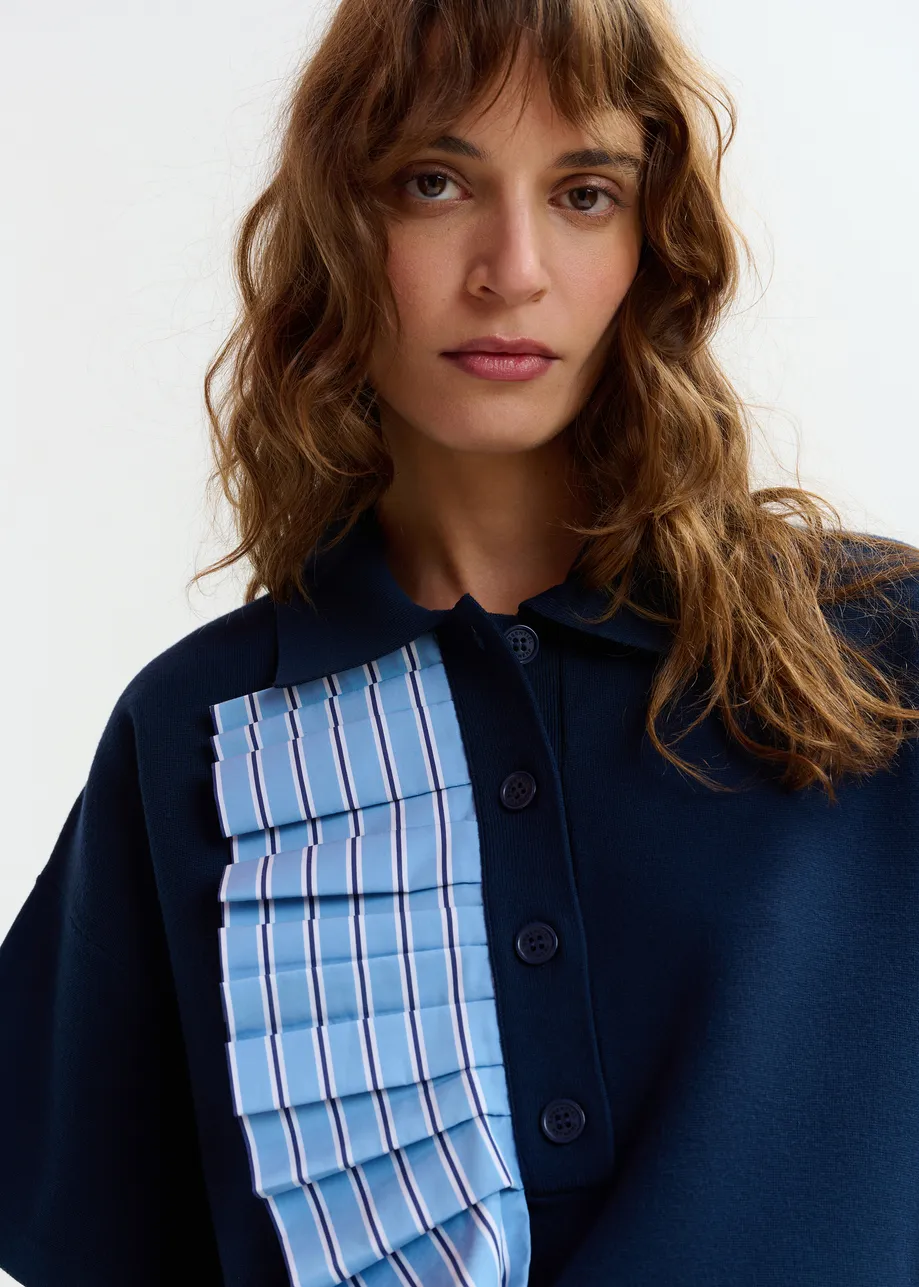 Marine- en lichtblauwe fijngebreide polo met volants