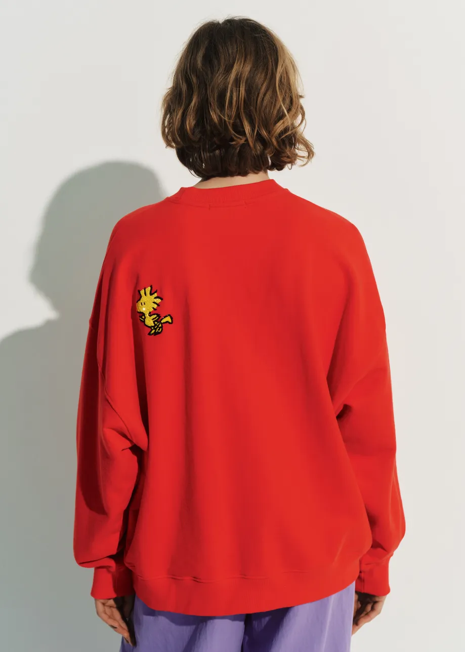 Red cotton sweatshirt with Peanuts™ Snoopy motif