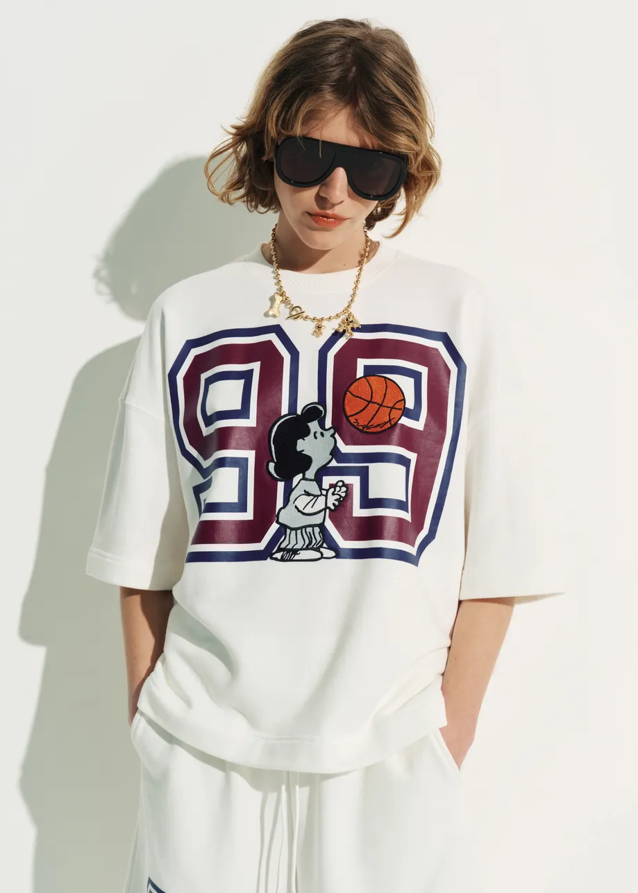 T-shirt en blanc cassé avec écusson Peanuts™ Lucy appliqué et imprimé textuel