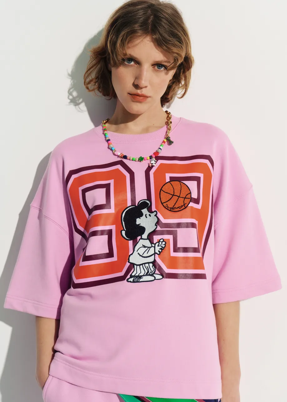 T-shirt rose avec patch Peanuts™ Lucy appliqué et imprimé texte