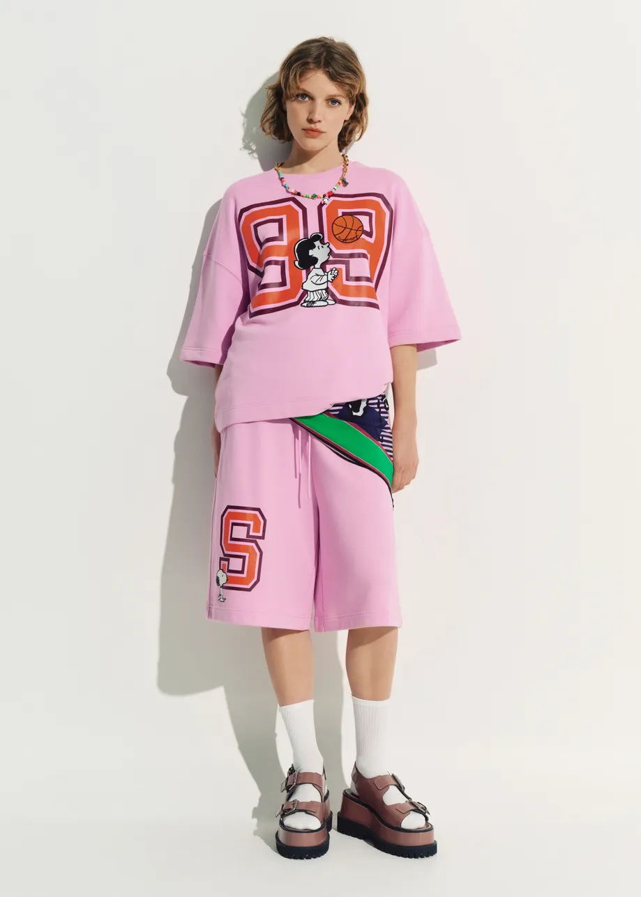 T-shirt rose avec patch Peanuts™ Lucy appliqué et imprimé texte