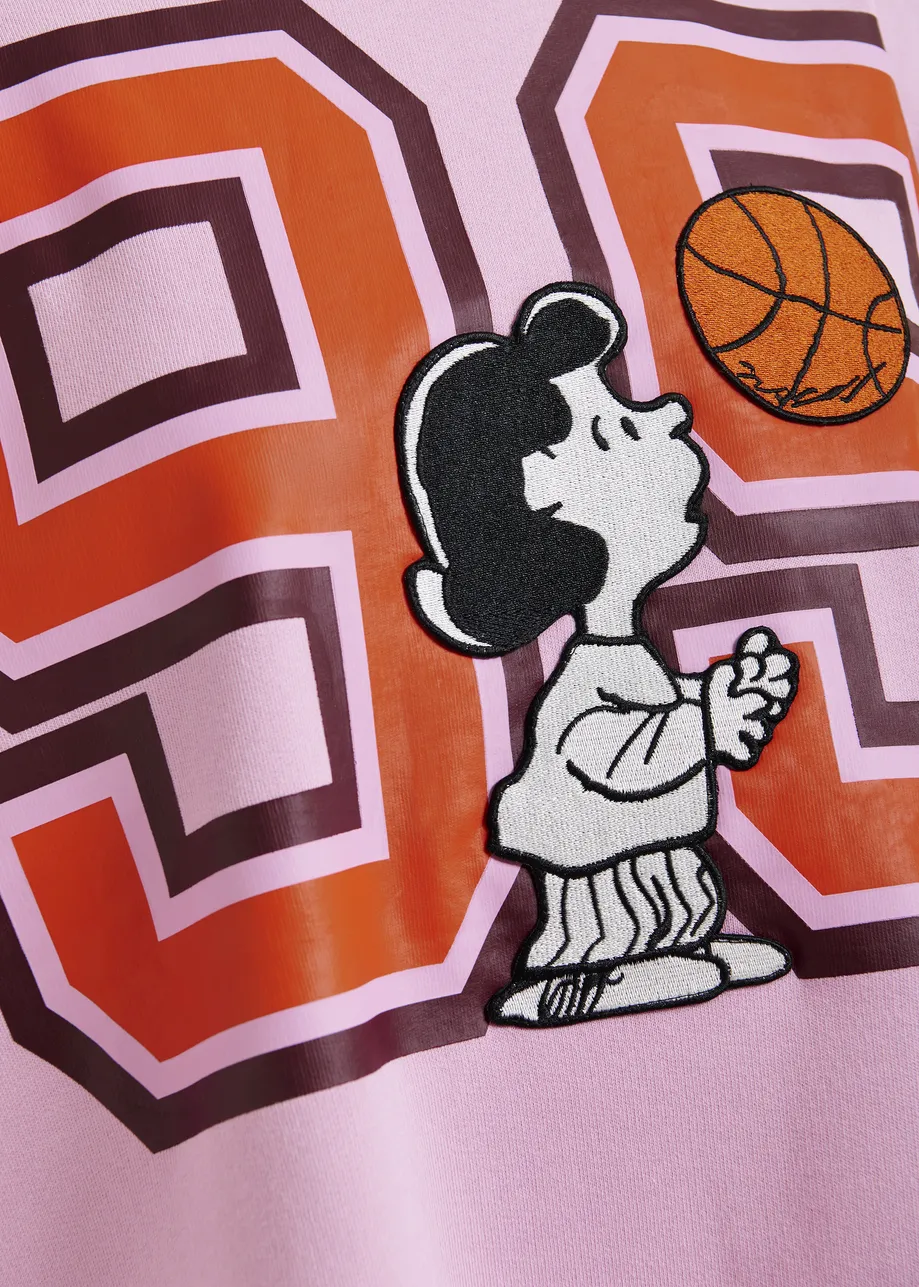 T-shirt rose avec patch Peanuts™ Lucy appliqué et imprimé texte