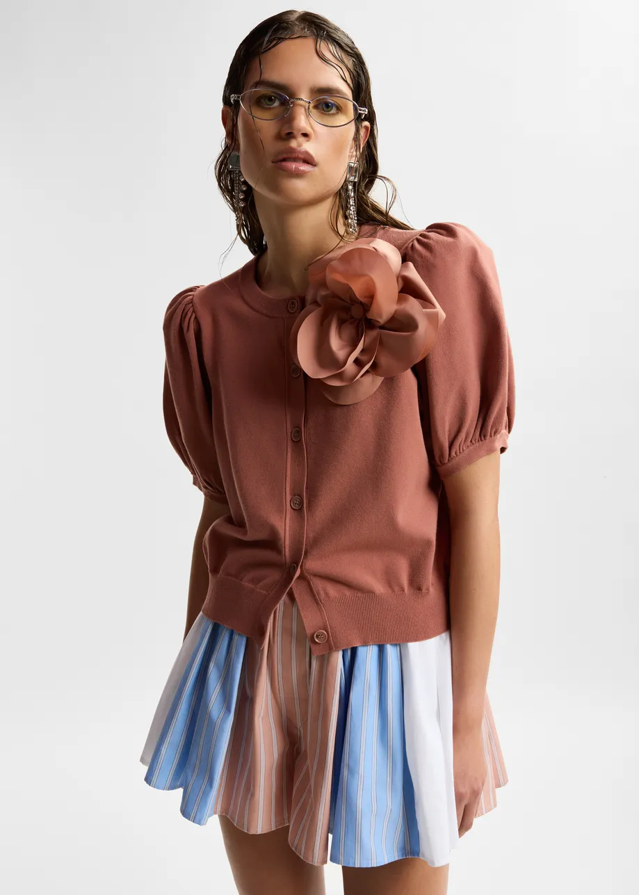 Terracotta fine knit cardigan with oversized flower brooch