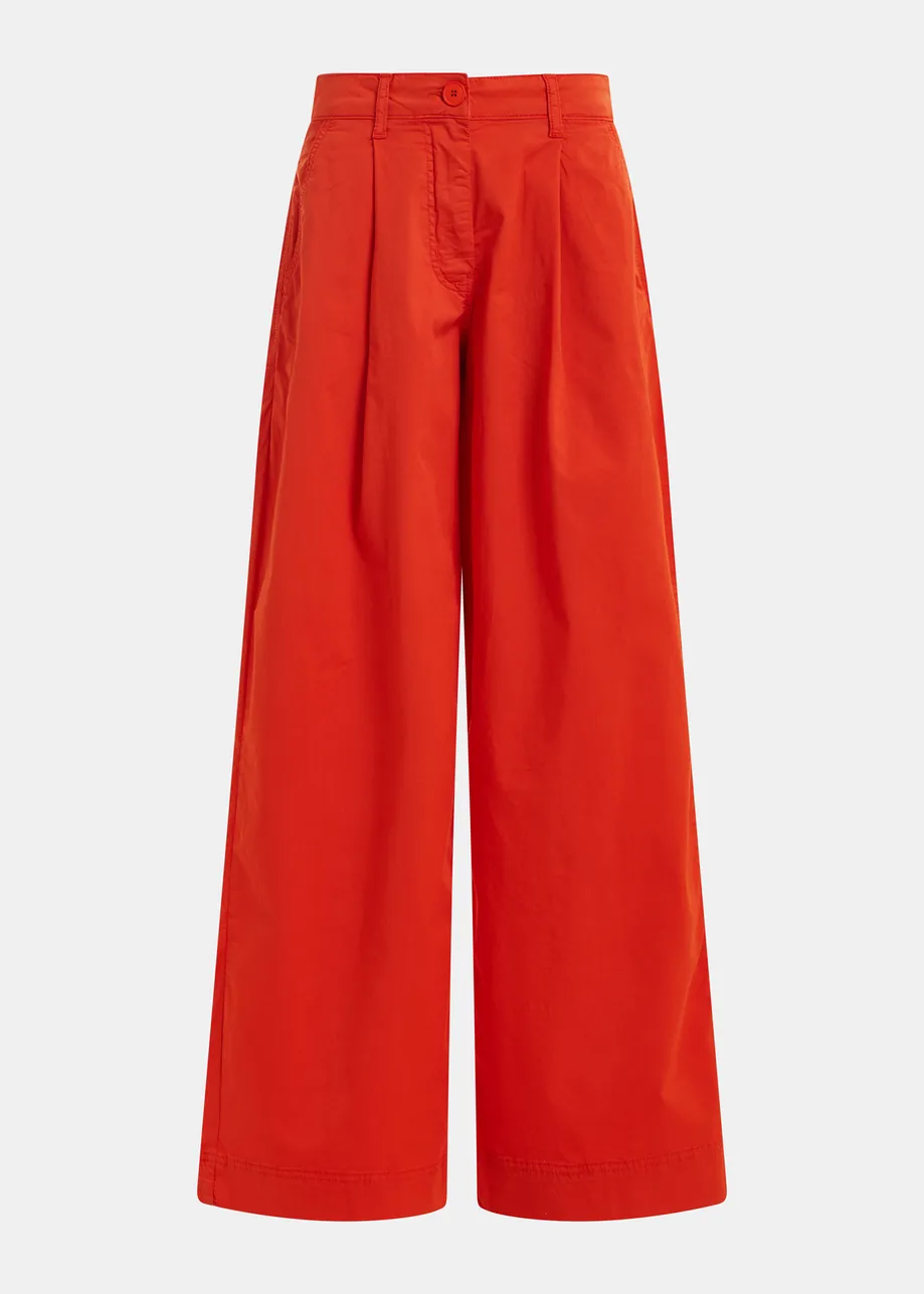 Orange pleated wide-leg pants