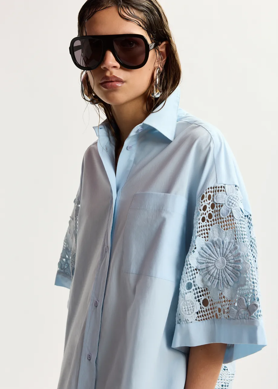 Light blue oversized cotton short-sleeve shirt with lace inserts