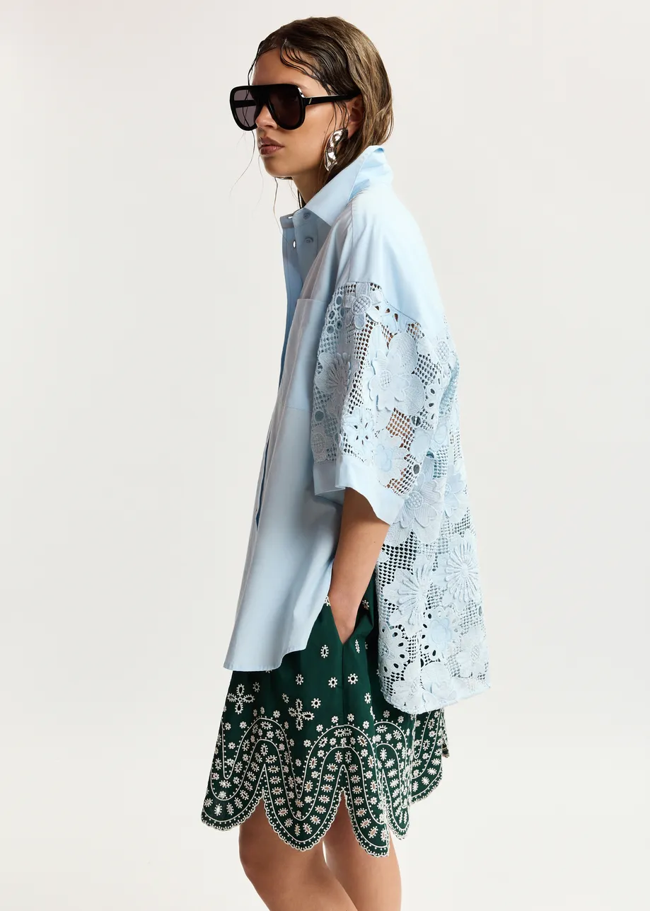 Light blue oversized cotton short-sleeve shirt with lace inserts