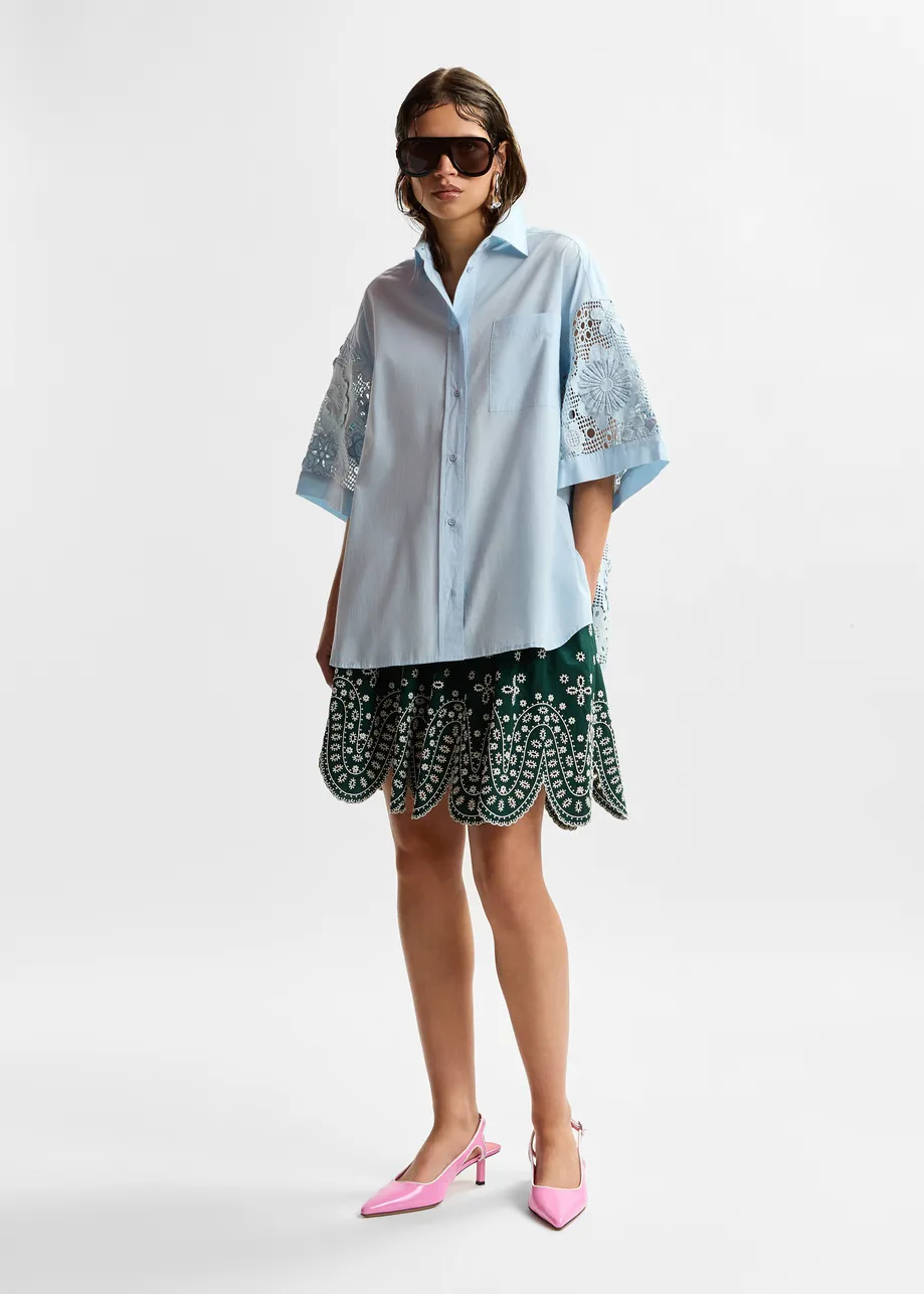 Light blue oversized cotton short-sleeve shirt with lace inserts