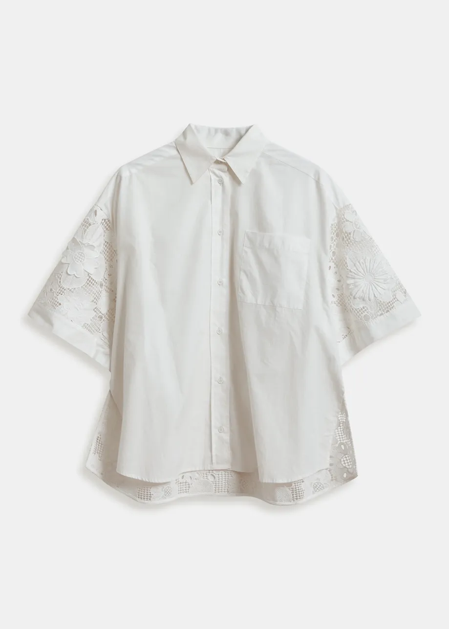 White oversized cotton short-sleeve shirt with lace inserts