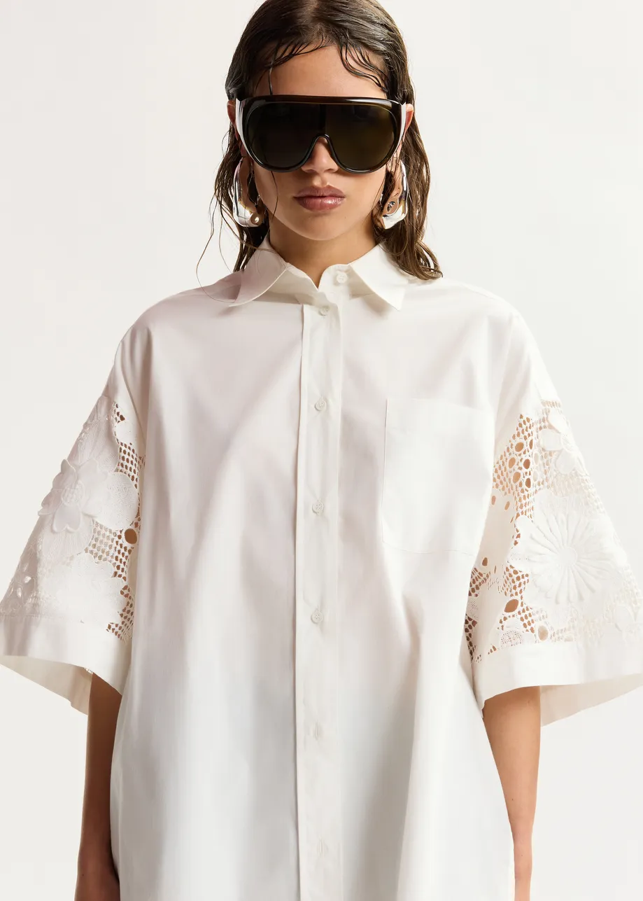 White oversized cotton short-sleeve shirt with lace inserts