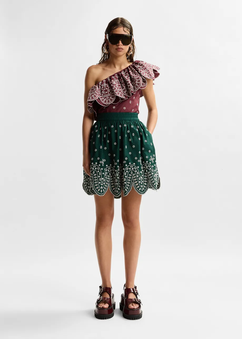 Dark green and white embroidered cotton skirt with scalloped hemline