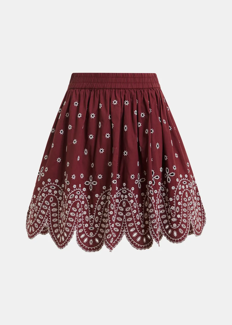 Dark red and white embroidered cotton skirt with scalloped hemline