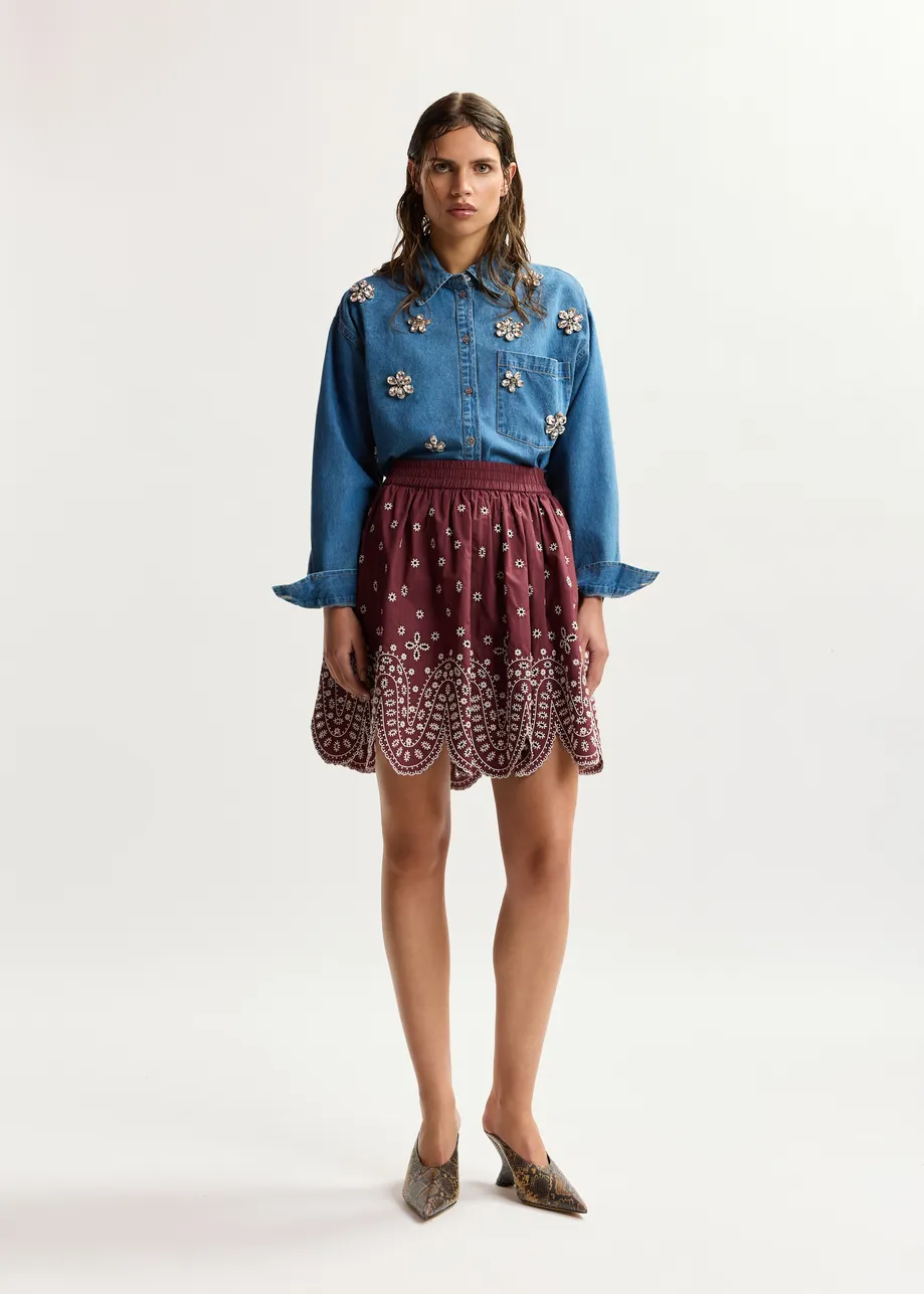 Dark red and white embroidered cotton skirt with scalloped hemline