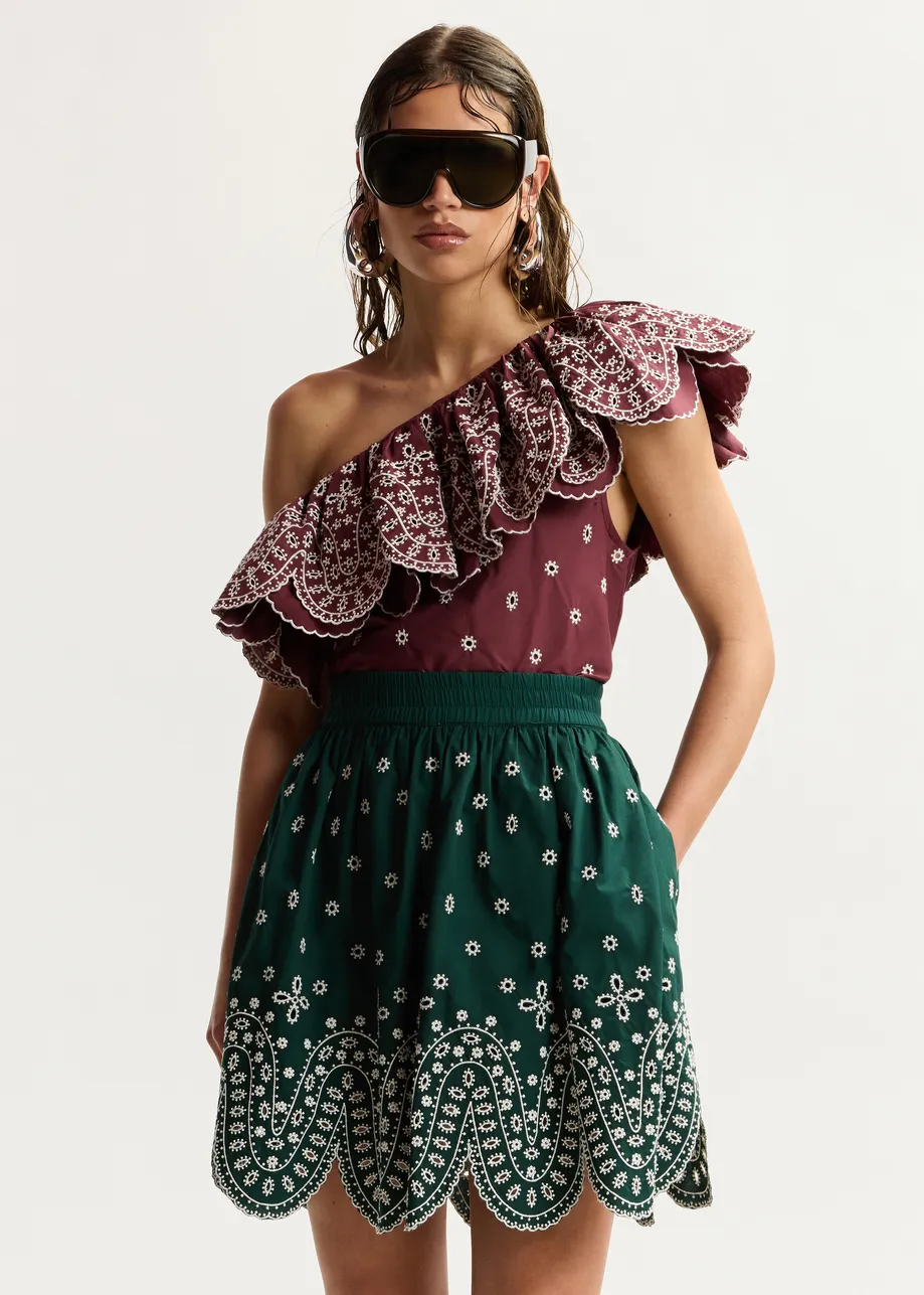 Dark red and white embroidered one-shoulder cotton top with ruffle detailing 
