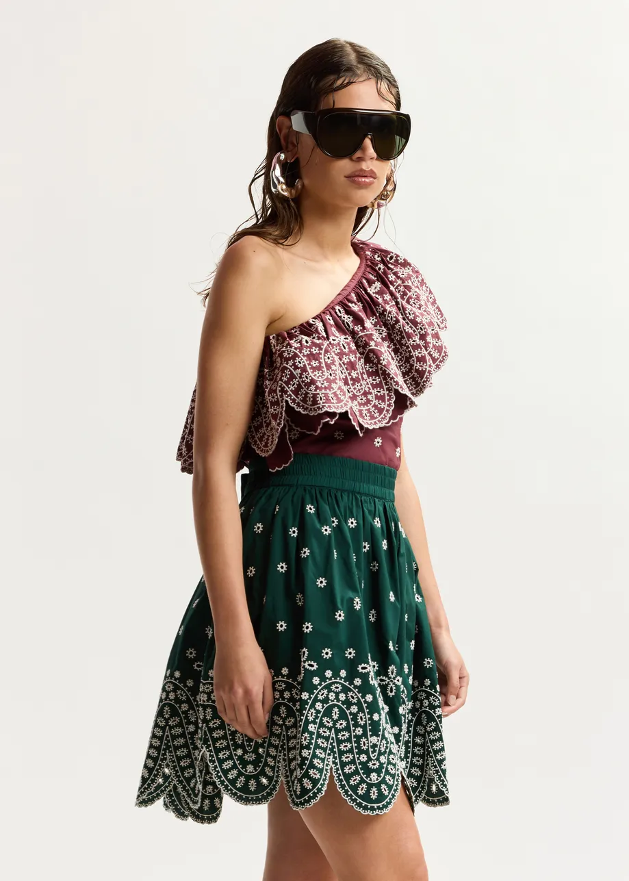 Dark red and white embroidered one-shoulder cotton top with ruffle detailing 