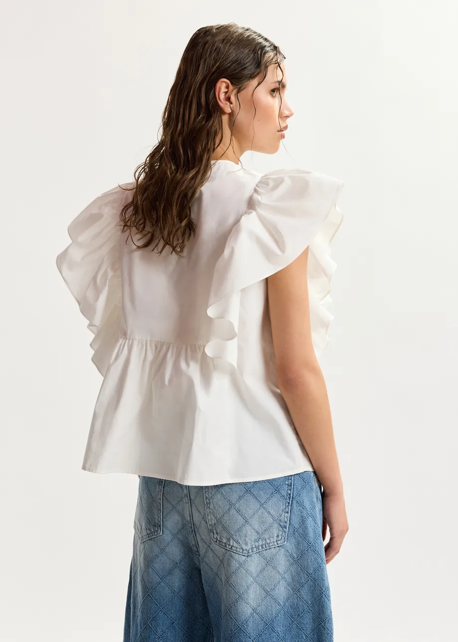 White cotton peplum top with lace-embroidered front and ruffled sleeves
