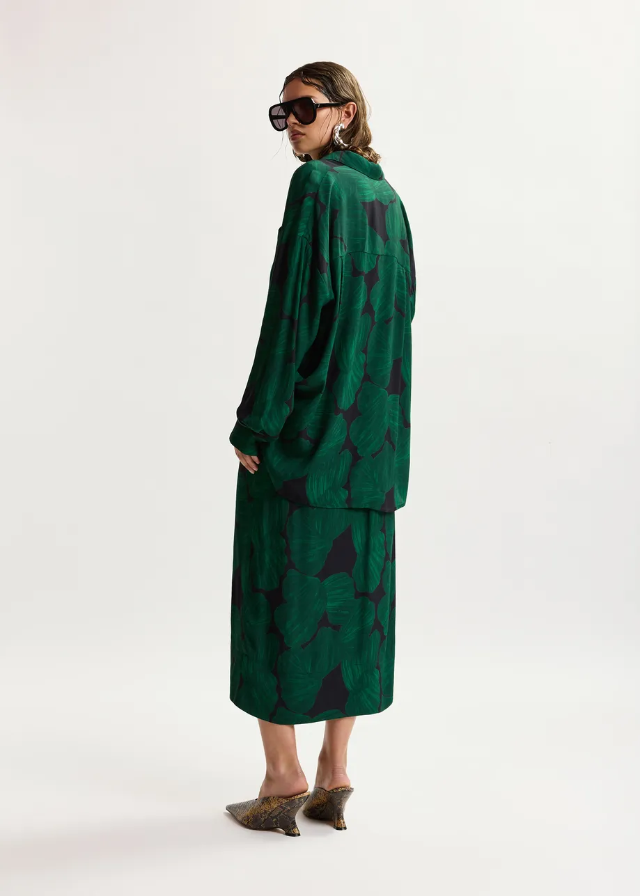 Gonna midi drappeggiata, verde scuro e nera, con stampa tropicale