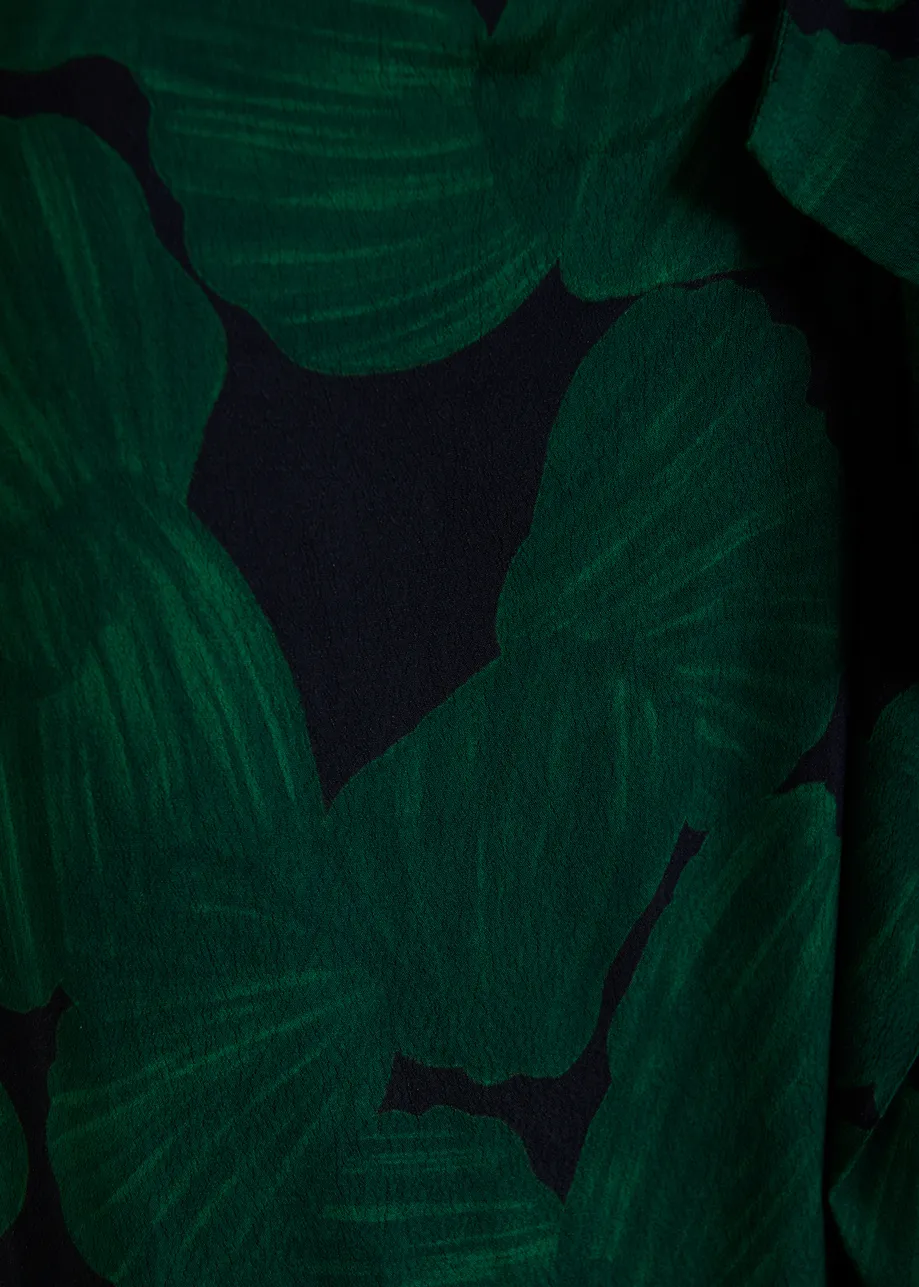 Gonna midi drappeggiata, verde scuro e nera, con stampa tropicale