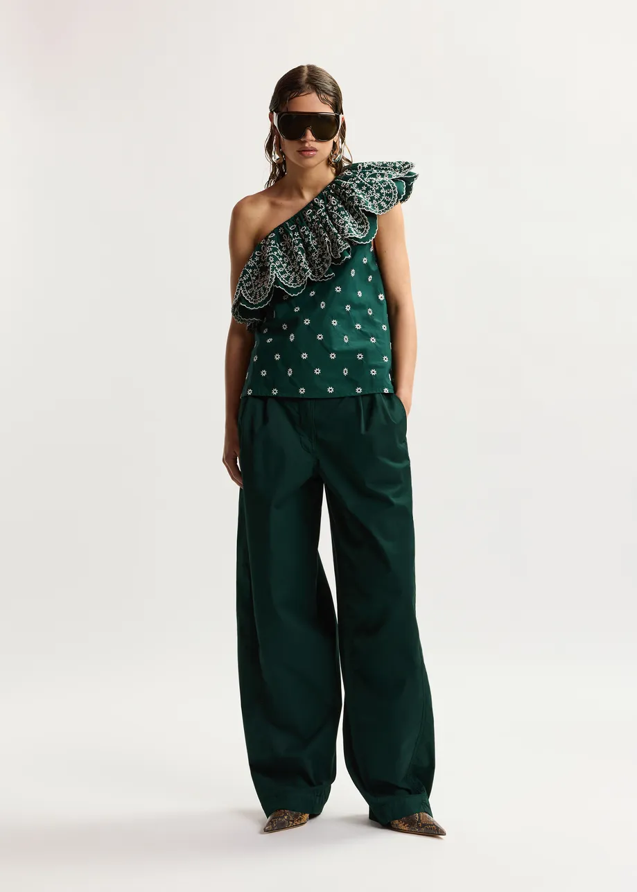 Khaki tapered cotton pants with twisted seams