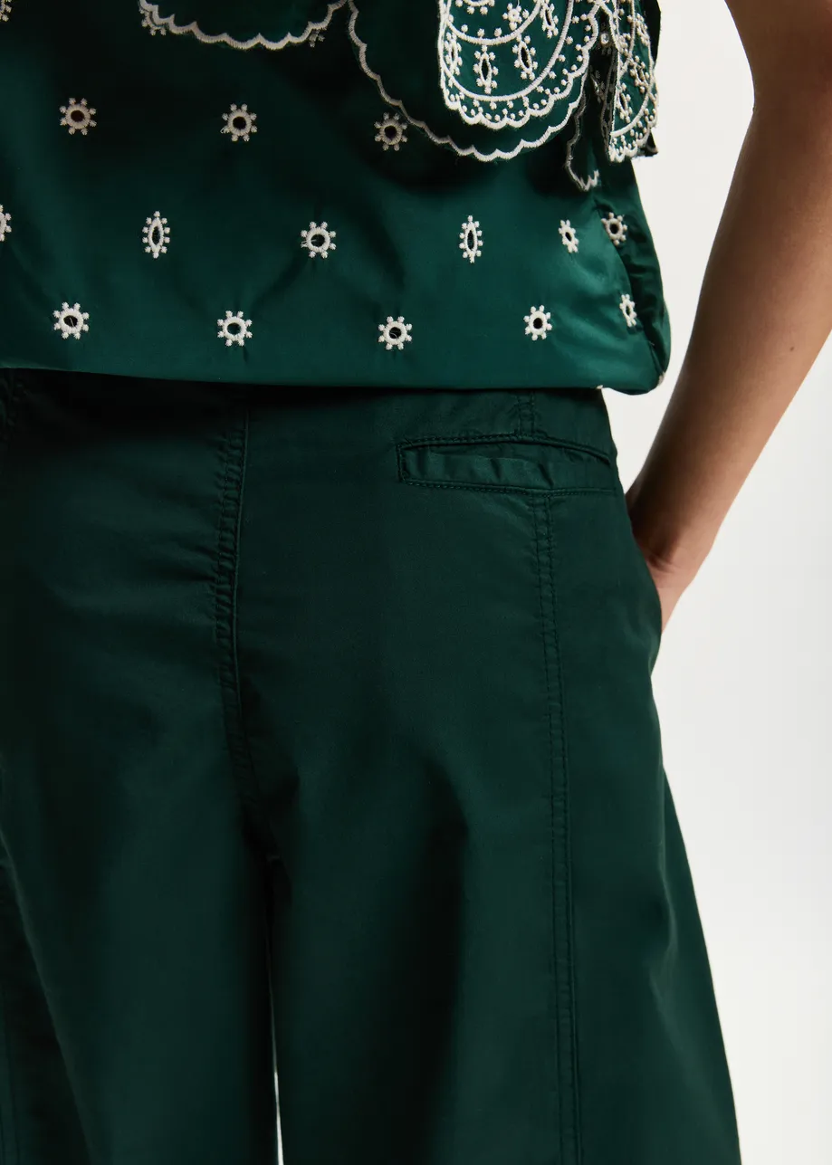 Khaki tapered cotton pants with twisted seams