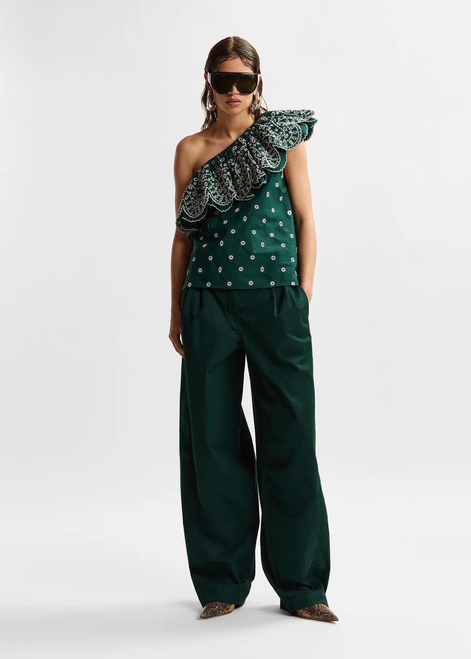 Khaki tapered cotton pants with twisted seams